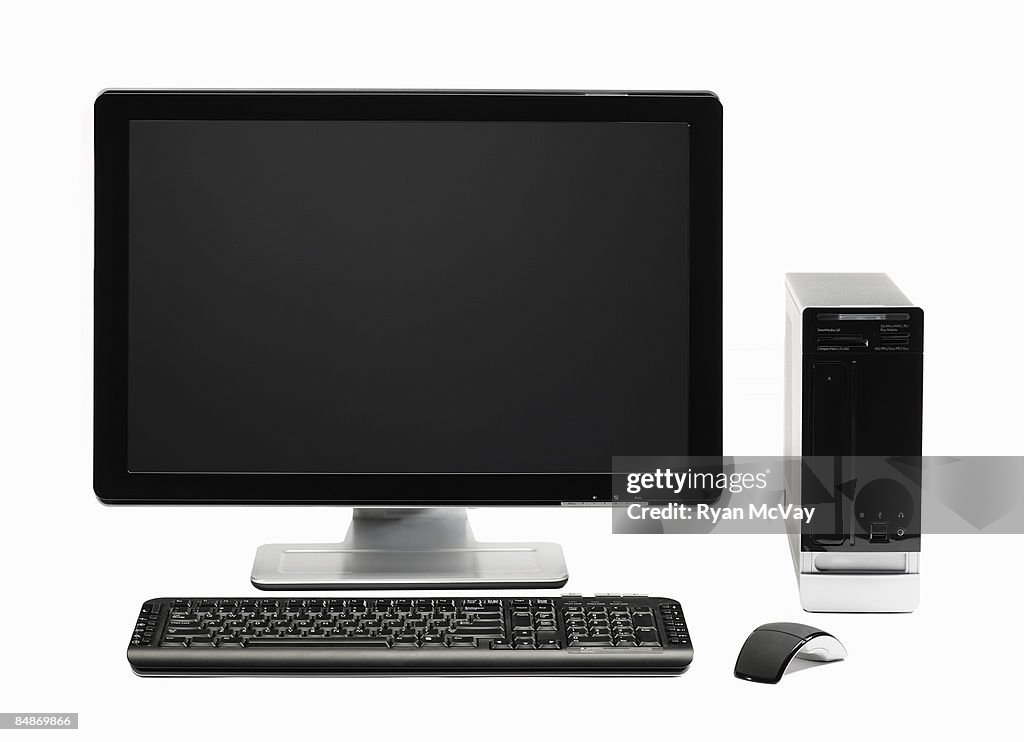 Computer with flat screen and mouse
