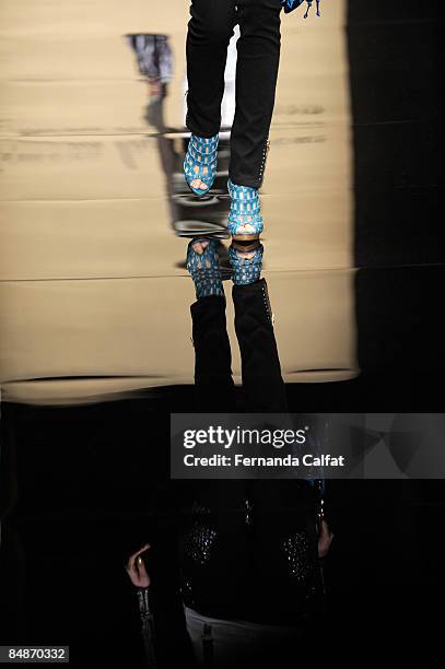 Model walks the runway at the Baby Phat & KLS Collection Fall 2009 fashion show during Mercedes-Benz Fashion Week at Gotham Hall on February 17, 2009...