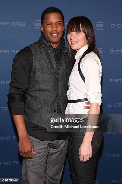 Actor Nate Parker and wife Sarah Parker pose backstage at the G Star Fall 2009 fashion show during Mercedes-Benz Fashion Week at the Hammerstein...