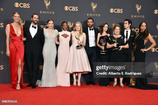 Cast of 'The Handmaid's Tale', winners of Outstanding Drama Series, pose in the press room during the 69th Annual Primetime Emmy Awards at Microsoft...