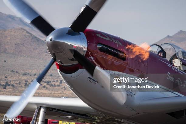 Unlimited gold class winning plane named Strega flames up during ignition at the Reno Championship Air Races on September 17, 2017 in Reno, Nevada.
