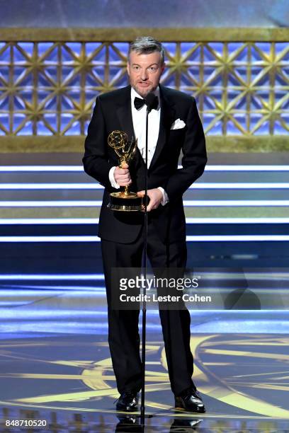 Writer-producer Charlie Brooker accepts the Outstanding Television Movie award for 'Black Mirror' onstage during the 69th Annual Primetime Emmy...