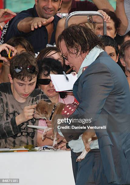 Actor Mickey Rourke and dog Loki attend the Closing Ceremony at the Sala Grande during the 65th Venice Film Festival on September 6, 2008 in Venice,...