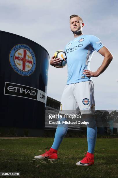 New marquet signing Marcin Budzinksi poses during a Melbourne City A-League press conference at the City Football Academy on September 18, 2017 in...