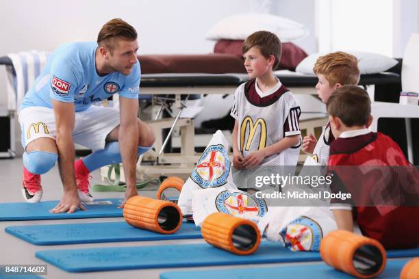 New marquet signing Marcin Budzinksi speaks to McDonalds Junior program kids during a Melbourne City A-League press conference at the City Football...