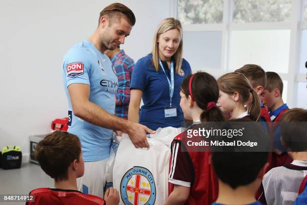 New marquet signing Marcin Budzinksi speaks to McDonalds Junior program kids during a Melbourne City A-League press conference at the City Football...