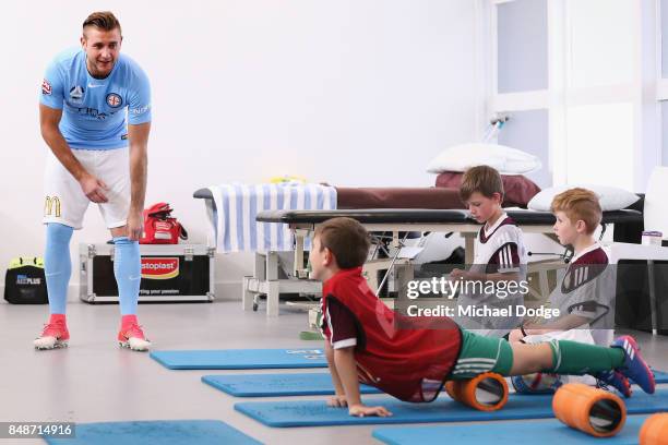 New marquet signing Marcin Budzinksi speaks to McDonalds Junior program kids during a Melbourne City A-League press conference at the City Football...