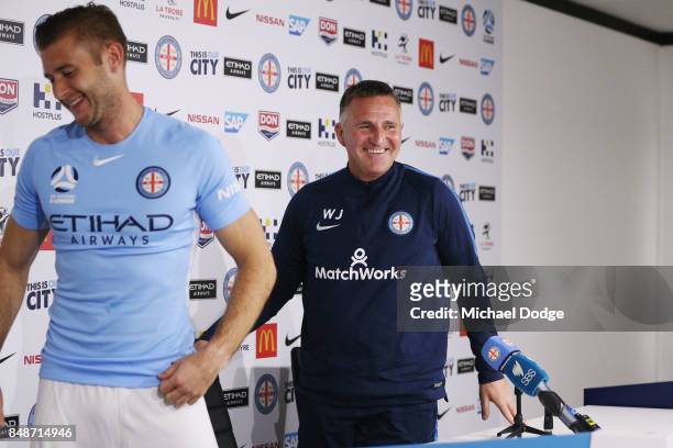 New marquet signing Marcin Budzinksi leaves with coach Warrem Joyce after speaking to media during a Melbourne City A-League press conference at the...