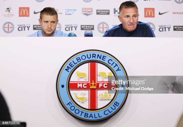 New marquet signing Marcin Budzinksi and coach Warrem Joyce speak to media during a Melbourne City A-League press conference at the City Football...
