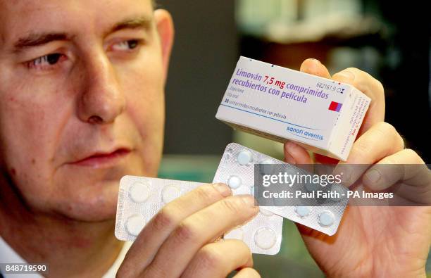 Health Minister Edwin Poots with some of the recovered illegal medicines and prescription drugs, seized in 'Operation Pangea V' ', Belfast, Northern...