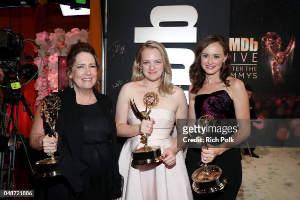 Actors Ann Dowd, Elisabeth Moss, and Alexis Bledel, winners of the award for Outstanding Drama Series for 'The Handmaid's Tale,' attend IMDb LIVE...