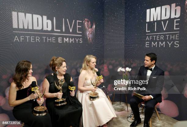 Actors Alexis Bledel, Ann Dowd, and Elisabeth Moss, winners of the award for Outstanding Drama Series for 'The Handmaid's Tale,' and host Dave Karger...