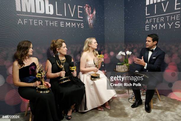 Actors Alexis Bledel, Ann Dowd, and Elisabeth Moss, winners of the award for Outstanding Drama Series for 'The Handmaid's Tale,' and host Dave Karger...