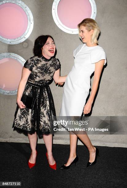 Daisy Lewis and Agyness Deyn arriving at a gala screening of the film Pusher at the Hackney Picturehouse, London.