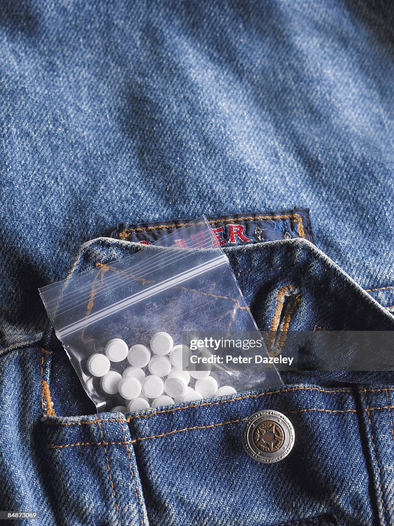 Ecstasy pills in denim pocket.