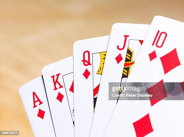 poker hand diamond running flush. - royal flush stock-fotos und bilder