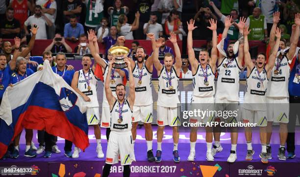 Slovenia's players celebrate with their trophy after defeating Serbia at the end of the FIBA Eurobasket 2017 men's Final basketball match between...