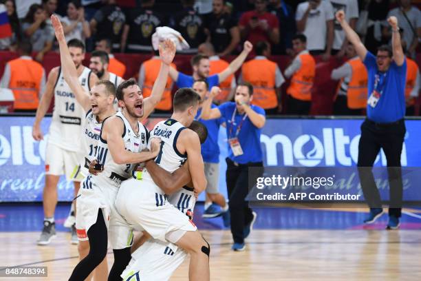 Slovenia's players celebrate after defeating Serbia during the FIBA Eurobasket 2017 men's Final basketball match between Slovenia and Serbia at Sinan...