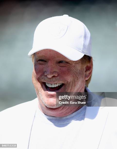 Oakland Raiders owner Mark Davis stands on the field before their game against the New York Jets at Oakland-Alameda County Coliseum on September 17,...