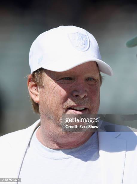Oakland Raiders owner Mark Davis stands on the field before their game against the New York Jets at Oakland-Alameda County Coliseum on September 17,...