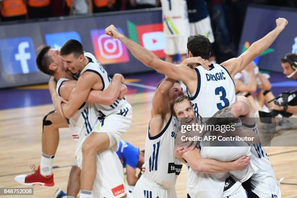 Slovenia's players celebrate after defeating Serbia during the FIBA Eurobasket 2017 men's Final basketball match between Slovenia and Serbia at Sinan...
