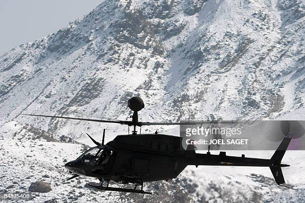 Kiowa helicopter overflies FOB Morales-Frazier in Nijrab on February 17, 2009. The deterioration in security in Afghanistan has alarmed its Western...