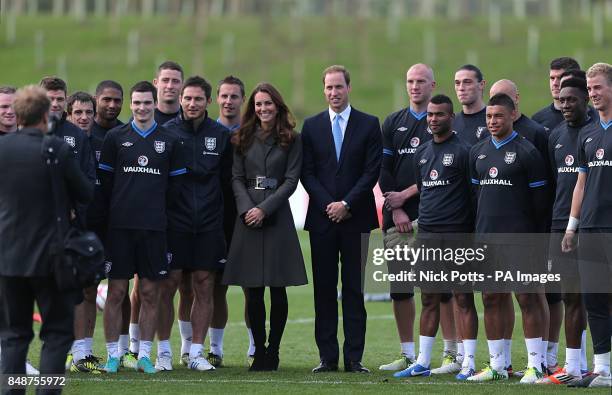 The Duke and Duchess of Cambridge pose for a photograph with the England squad during the official launch of The Football Association's National...