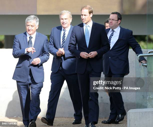 The Duke of Cambridge is given a tour of St George's Park by FA chairman David Bernstein, FA director of football development Trevor Brooking and FA...