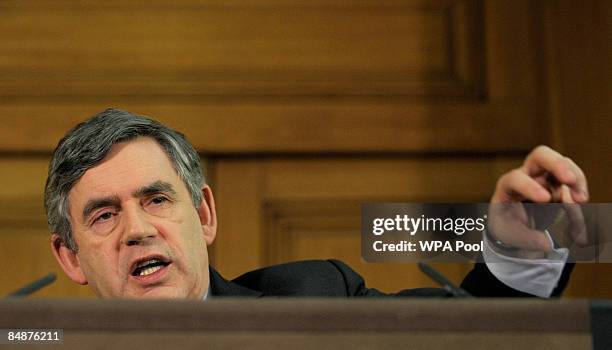 Britain's Prime Minister Gordon Brown gestures while speaking at his monthly news conference at Number 10 Downing Street on February 18, 2009 in...