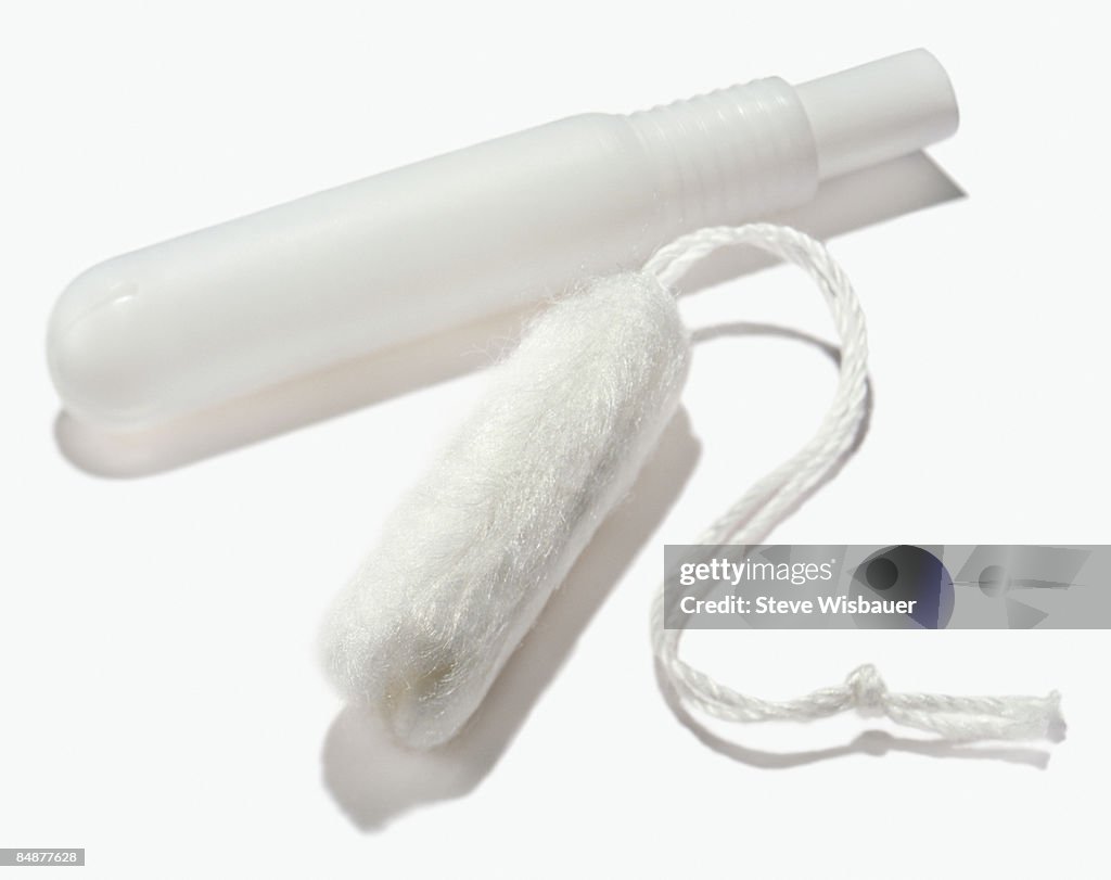 Tampon and plastic disposable applicator