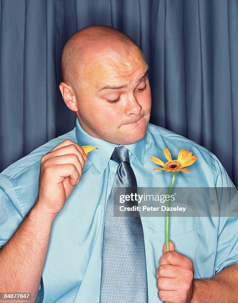 she loves me, she loves me not. - man plucking eyebrows stock pictures, royalty-free photos & images