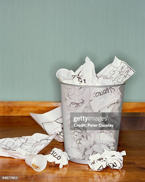 paper concepts in garbage bin - waste basket stock pictures, royalty-free photos & images