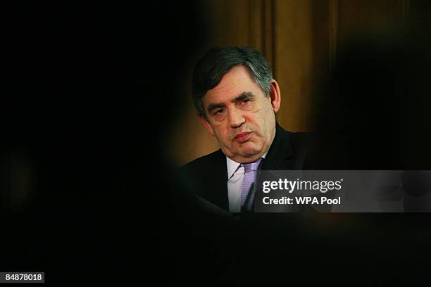 Britain's Prime Minister Gordon Brown looks on during his monthly news conference at Number 10 Downing Street on February 18, 2009 in London,...