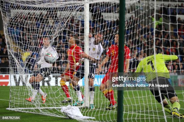 Scotland's Steven Fletcher thinks he has scored but the goal is disallowed