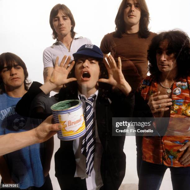 Photo of AC DC and Malcolm YOUNG and Cliff WILLIAMS and Bon SCOTT and Angus YOUNG and AC/DC and Phil RUDD, L-R: Malcolm Young, Phil Rudd, Angus Young...