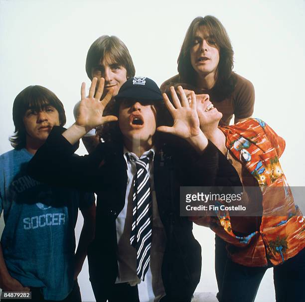 Photo of AC DC and Malcolm YOUNG and Cliff WILLIAMS and Bon SCOTT and Angus YOUNG and AC/DC and Phil RUDD, L-R: Malcolm Young, Phil Rudd, Angus...