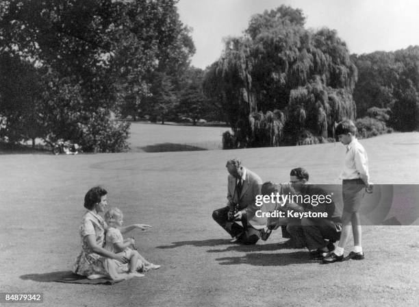 The Belgian royal family enjoy a day out at Laeken, a suburb of Brussels, 1953. The former King Leopold III , Prince Albert , King Baudouin I and...