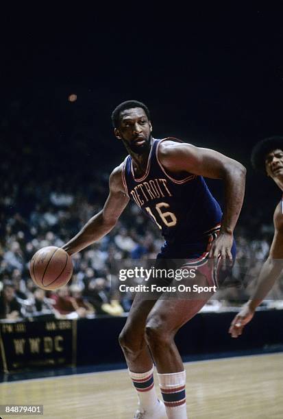 S: Bob Lanier of the Detroit Pistons in action working down low against Wes Unseld of the Washington Bullets during a mid circa 1970's NBA basketball...