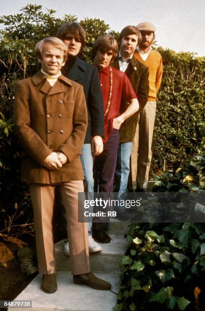 Photo of Carl WILSON and Dennis WILSON and BEACH BOYS and Bruce JOHNSTON and Al JARDINE and Mike LOVE; Posed group portrait. Front to back: Al...