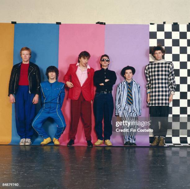 Photo of Gerry COTT and BOOMTOWN RATS and Garry ROBERTS and Bob GELDOF and Johnnie FINGERS and Pete BRIQUETTE and Simon CROWE; Posed studio group...