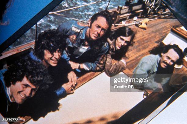 Portrait of American Psychedelic Rock group Quicksilver Messenger Service on the deck of a sailboat, circa 1970. Pictured are, from left, David...