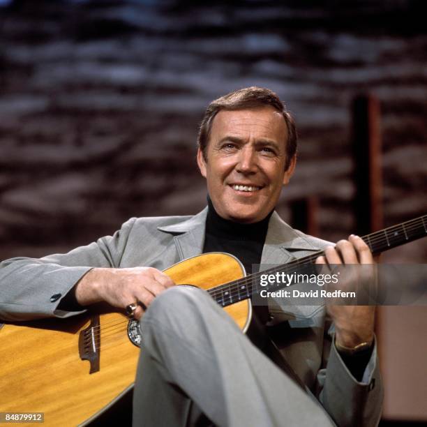 Irish singer Val Doonican performs on a BBC television show at Television Centre, London circa 1970.