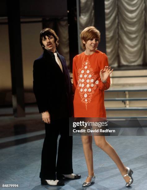 Ringo Starr of The Beatles performs the duet 'Do You Like Me' with singer Cilla Black on the BBC Show of the Week 'Cilla' at BBC Television Theatre...