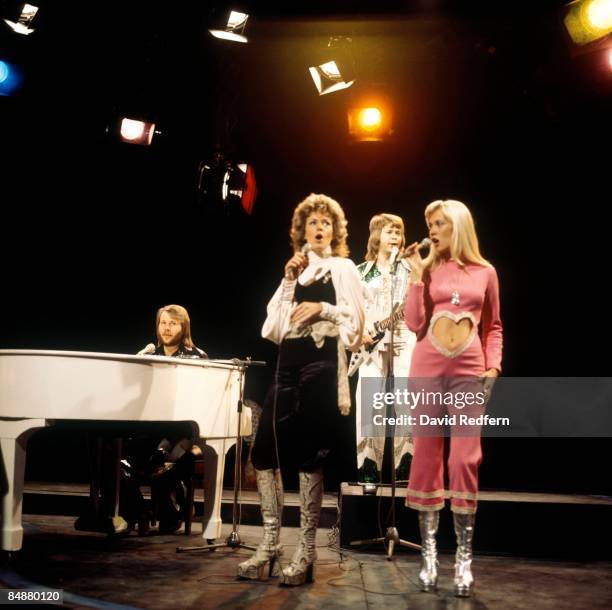 Photo of ABBA, L-R: Benny Andersson, Anni-Frid Lyngstad, Bjorn Ulvaeus, Agnetha Faltskog performing 'Waterloo' on Top Of The Pops TV Show