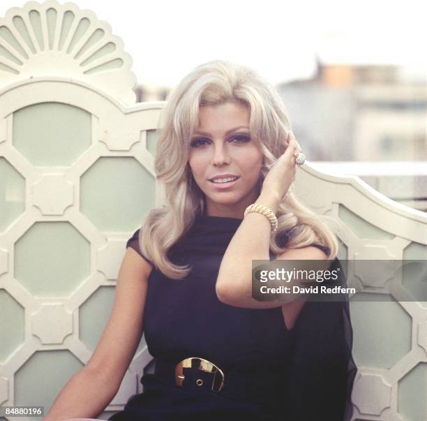American singer and actress Nancy Sinatra posed at a hotel roof garden in London on 8th May 1967.