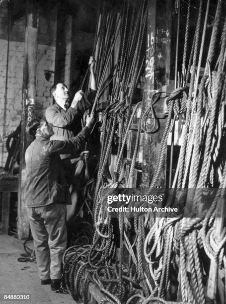 Row of pulley ropes backstage at the Theatre Royal in Bristol, later the Bristol Old Vic, circa 1940.