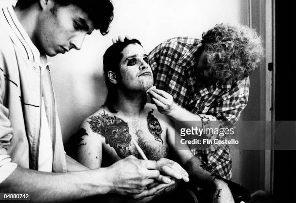 Photo of Ozzy OSBOURNE; with Greg Channon, make-up artist on 'Nightmare on Elm Street', doing make-up for 'Bark At The Moon' album cover session