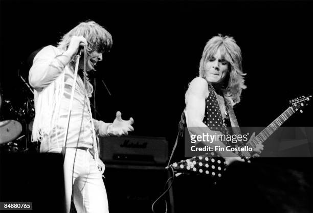 Photo of Randy RHOADS and Ozzy OSBOURNE; with his guitarist Randy Rhoads, performing live onstage at Gaumont Theatre