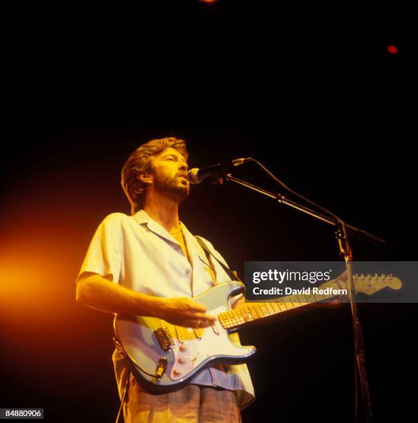 English guitarist Eric Clapton performs live on stage playing a Fender Stratocaster guitar at Wembley Arena in London on 5th March 1985.