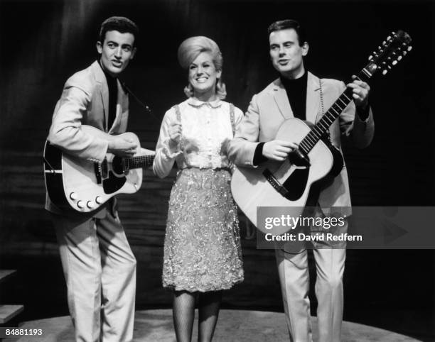 English pop folk group The Springfields, featuring from left, Mike Hurst, Dusty Springfield and Tom Springfield, perform together on a television...